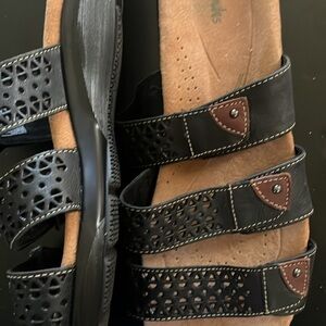 Women’s Black and Brown Clark Sandals